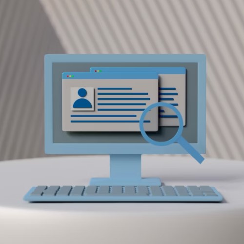 a computer screen sitting on top of a white table